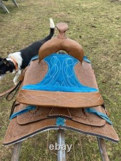 13 tan tooled leather youth / pony western saddle withturquoise suede seat