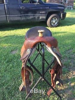 14.5 Tex tan hereford barrel saddle with 7 in gullet