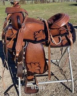 17 basket stamped Western trail/pleasure saddle withblack accents, matching tack