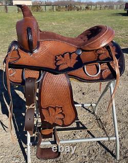 17 basket stamped Western trail/pleasure saddle withblack accents, matching tack