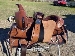 17 basket stamped Western trail/pleasure saddle withblack accents, matching tack