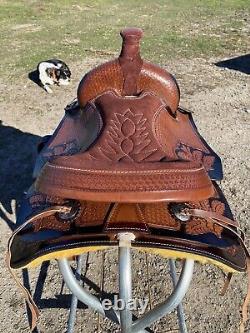 17 basket stamped Western trail/pleasure saddle withblack accents, matching tack