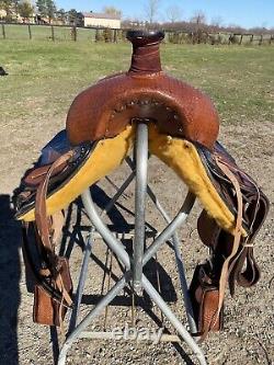 17 basket stamped Western trail/pleasure saddle withblack accents, matching tack