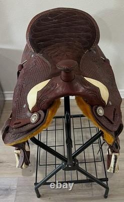 18 Seat Western Horse Saddle and Stand. Valued @ $1200.00 Asking $600.00