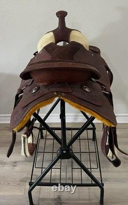 18 Seat Western Horse Saddle and Stand. Valued @ $1200.00 Asking $600.00