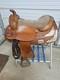A Used 17 Brown Color Trail Saddle With Some Tooling And Silver
