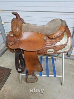 A Used 17 Brown Color Trail Saddle with Some Tooling and Silver