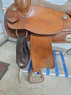 A Used 17 Brown Color Trail Saddle with Some Tooling and Silver