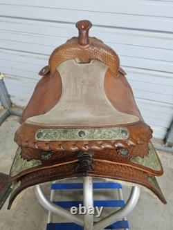 A Used 17 Brown Color Trail Saddle with Some Tooling and Silver