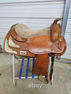 A Used 17 Brown Color Trail Saddle with Some Tooling and Silver