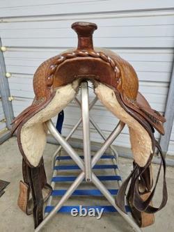 A Used 17 Brown Color Trail Saddle with Some Tooling and Silver