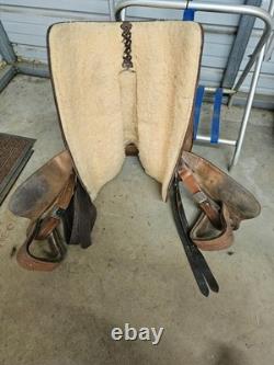 A Used 17 Brown Color Trail Saddle with Some Tooling and Silver