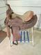A Good Used Brown Color 15 Leather Trail Saddle With Tooling
