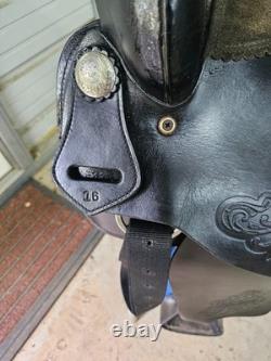 A good Used Used 16 black leather trail saddle