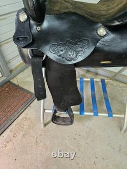 A good Used Used 16 black leather trail saddle