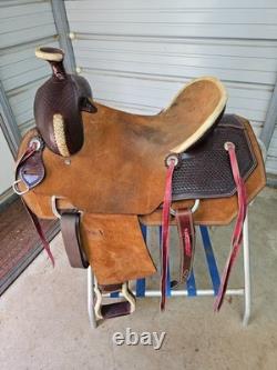 A used Brown color 16 Circle T Ranch Roper with Tooling