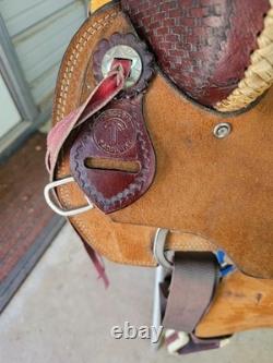 A used Brown color 16 Circle T Ranch Roper with Tooling