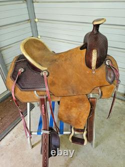 A used Brown color 16 Circle T Ranch Roper with Tooling