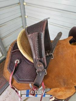 A used Brown color 16 Circle T Ranch Roper with Tooling