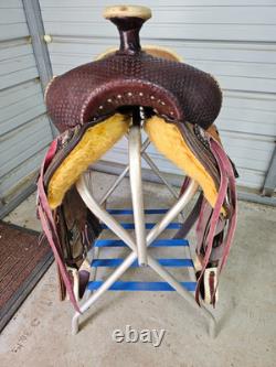 A used Brown color 16 Circle T Ranch Roper with Tooling