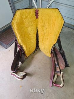 A used Brown color 16 Circle T Ranch Roper with Tooling