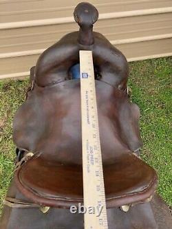 Antique/vintage R. T. Frazier 15.5 Western high back saddle with tapaderos