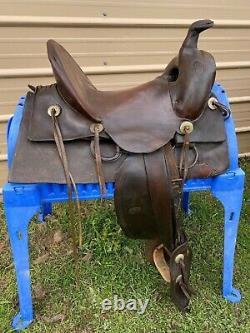 Antique/vintage R. T. Frazier 15.5 Western high back saddle with tapaderos