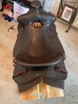 Antique/vintage ranch saddle. Restored to practical display or use