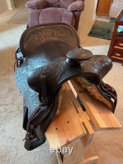 Antique/vintage ranch saddle. Restored to practical display or use