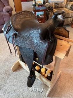Antique/vintage ranch saddle. Restored to practical display or use