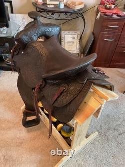 Antique/vintage ranch saddle. Restored to practical display or use