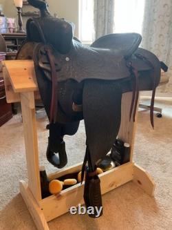 Antique/vintage ranch saddle. Restored to practical display or use