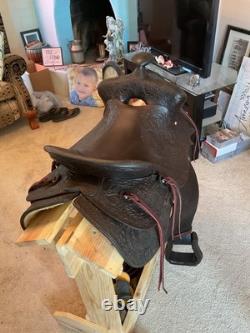 Antique/vintage ranch saddle. Restored to practical display or use