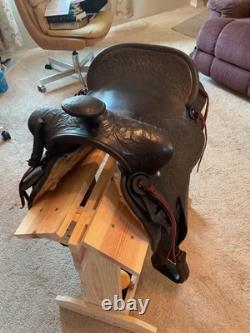 Antique/vintage ranch saddle. Restored to practical display or use