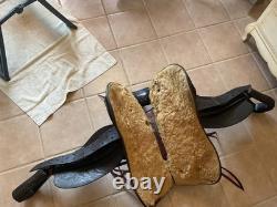 Antique/vintage ranch saddle. Restored to practical display or use