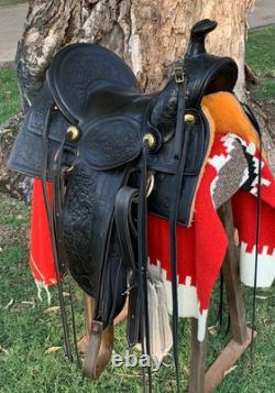 Antique western saddle, 1890 ca. Black, floral carved, 16 full seat A-fork