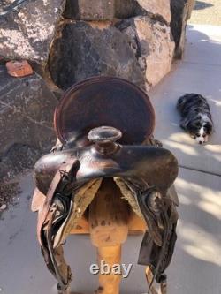 Antique western saddles