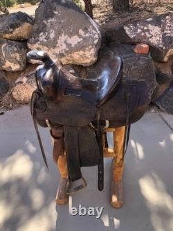 Antique western saddles