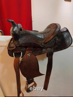 Brahma brand Tex Tan Western Leather Co. Ornate saddle 14 with grazing muzzle