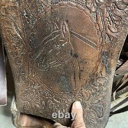 Cool horsehead Tooled vintage western saddle 15 seat