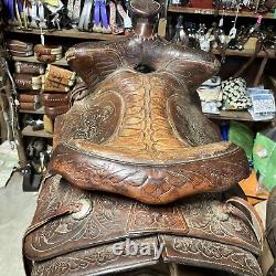 Cool horsehead Tooled vintage western saddle 15 seat