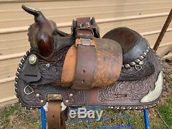 Flashy used 15 Buford tooled dark oil leather Western saddle withsilver US made