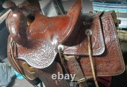 From Museum Heavy Large Hand Tooled Western Saddle by Monroe Veach