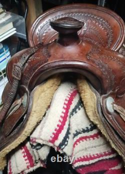 From Museum Heavy Large Hand Tooled Western Saddle by Monroe Veach