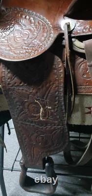 From Museum Heavy Large Hand Tooled Western Saddle by Monroe Veach