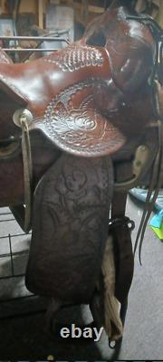 From Museum Heavy Large Hand Tooled Western Saddle by Monroe Veach