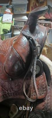 From Museum Heavy Large Hand Tooled Western Saddle by Monroe Veach