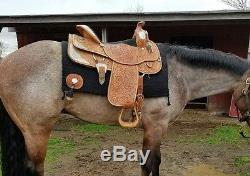 Gorgeous 16 Circle Y Western show saddle loaded with silver with breastcollar