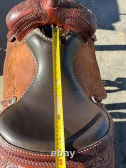 Lightly used Five Star Saddle, red tooled leather, Western