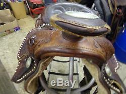 Nice Used 16 Seat Simco with buckstitching and fully tooled leather saddle